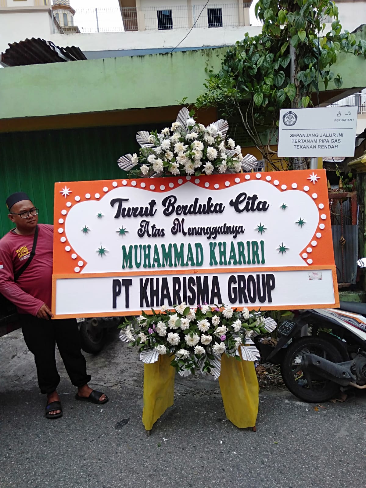 karangan bunga duka cita